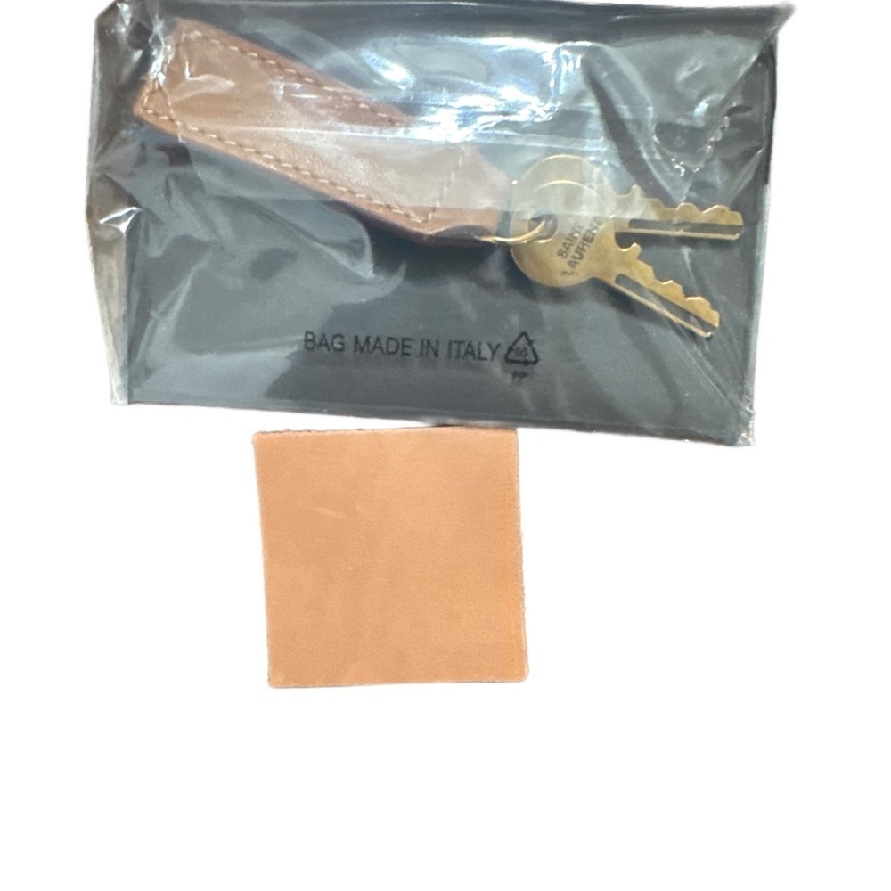 SAINT LAURENT 
SAC DE JOUR IN SUPPLE VEGETABLE LEATHER - Picture 9 of 10